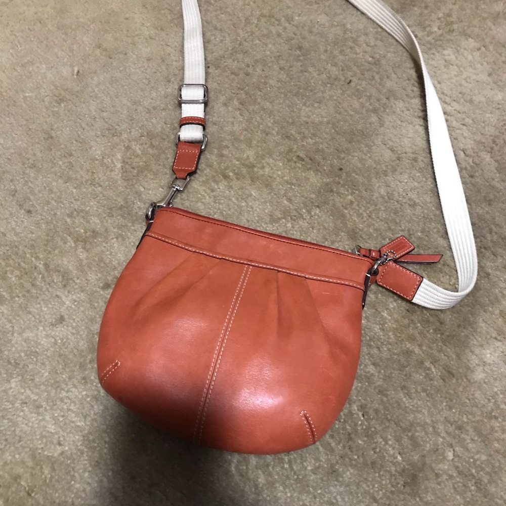Orange leather coach crossbody